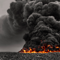 photograph of burning tires and a large cloud of black smoke, photography by mohammed alsultan catastrophe, disaster black smoke fire